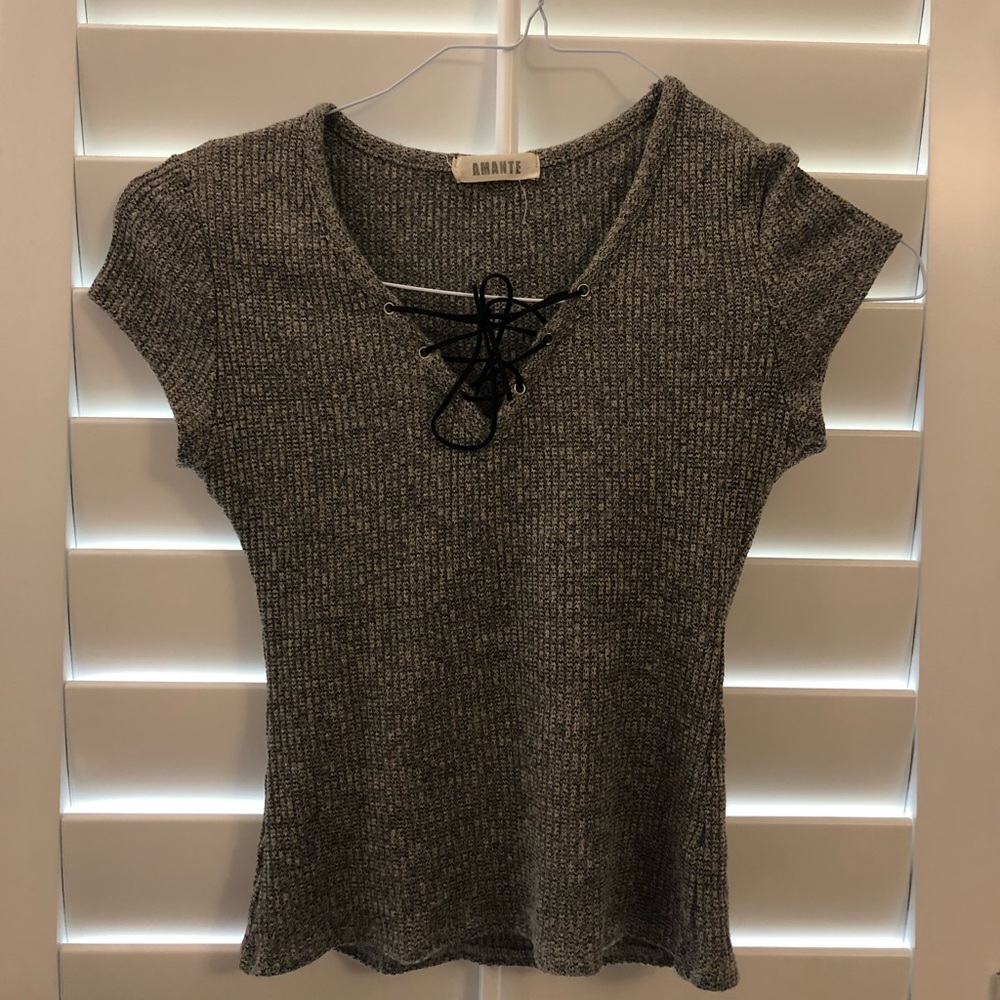 Grey shirt sleeve with tie up front